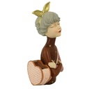 Donna resina con borsa portafiori marrone cm17x13h35
